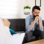 Man in a counseling session.